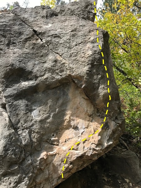 Climb up right through left-hand two finger pocket finish up right arete