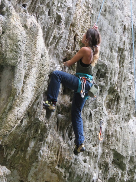 Looking for the next move, next to the overhanging tufa.