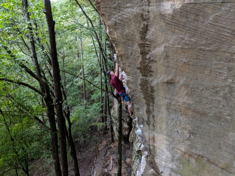 Doug Leggett onsighting "A Brief History of Climb"5.10a. Nice job Dougie! BEAUTIFUL line! Photo by Jaron Moss