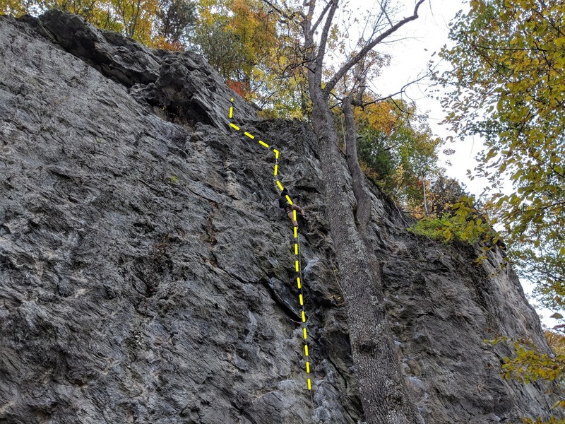 A photo that includes some more features at the top of the crag to make it a little easier to find this route.