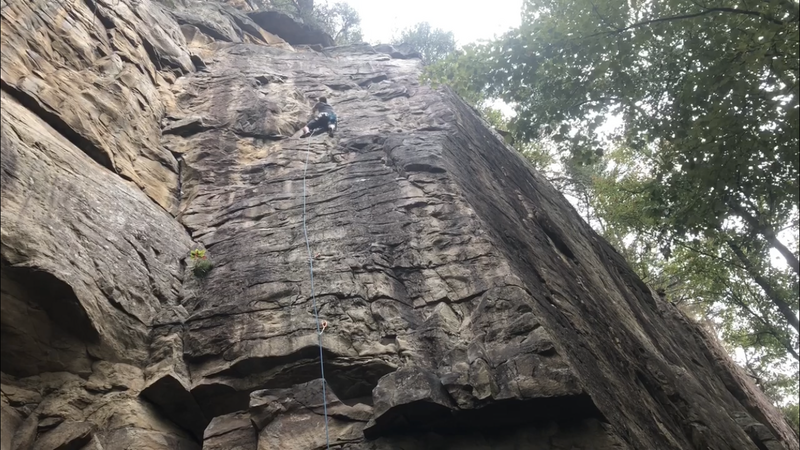 Climber is on Ankles away. Twist and Shout is about 8-10 feet to the right on the arete.
