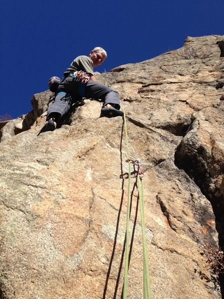 Midway up above the big ledge.