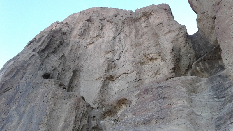 difficult to discern, but huge boot flake lurks above the rising traverse left to cracks around the corner
