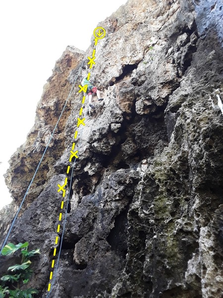 Brian Stewart checking out the route prior to bolting.