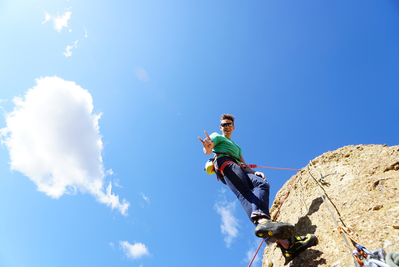A very pleased first ascensionist on top after the successful burn.