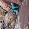 Lani getting into the hand crack of pitch 4. Photo by Sam Bowers