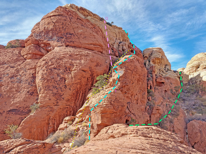 Calico South Viewpoint with three mini-buttresses (blue),
<br>
along R side of narrow left gully easier scramble (yellow dots) in center.
<br>
. Q pink = direct steep finish Variation
<br>
Wide gully toward Calico Peak summits is (green) on right side of photo