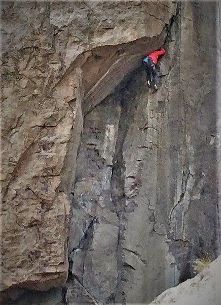 “Renowned guide book author Marty Blower Installs Lewis figuring out the crux on Point of Entry. Photo from the Tom Grundy collection”