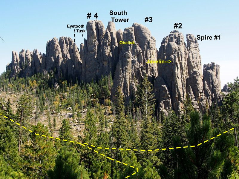Looking south towards the Spires from the Harney Peak Trail across the valley. Yellow dashed line is trail from highway, then splitting: Left (in photo, it's a Right on the ground) to Picket Fence. Trail to Harney Peak is at bottom of photo.