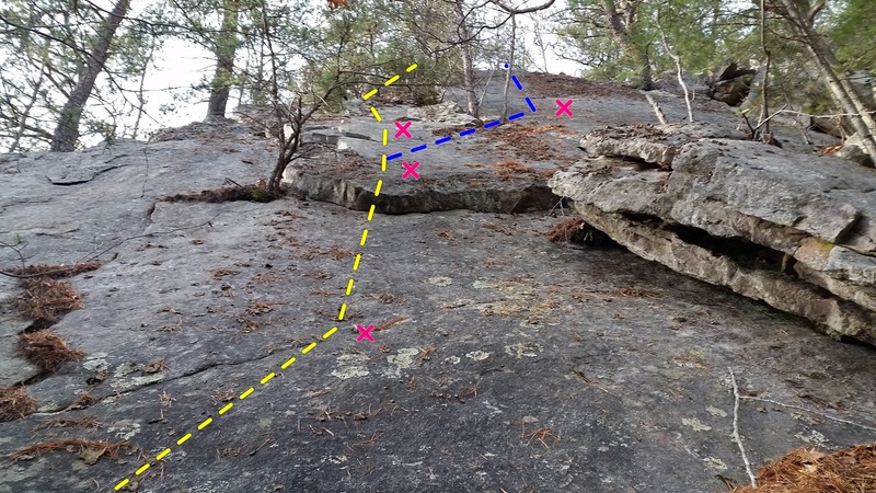 Looking up the route from the base of the crag. Main route is shown in Yellow, alternative finish on All About Mu in Blue