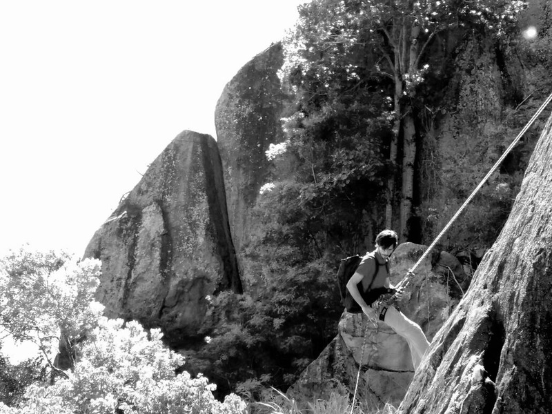 Rappelling to the base. Fenda do Urubu is the obvious crack in the back. Photo: Gillan