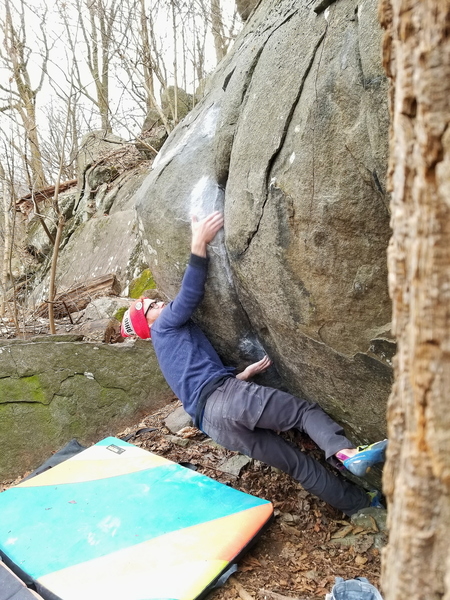 Emeric Quade on the opening move during a compression session in December. Coming up from double sidepull/undercling.