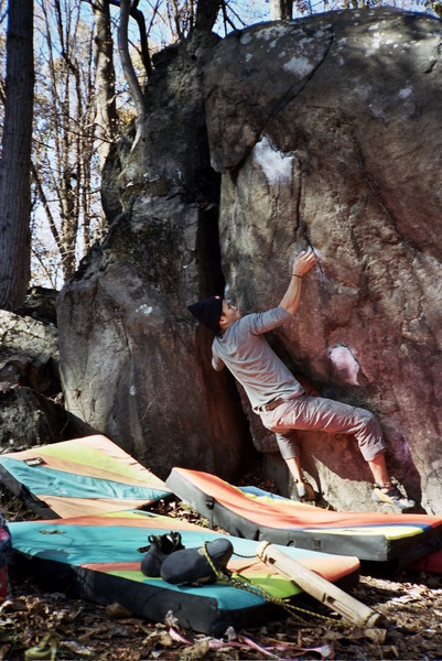 Sunkook on pre-break clutch--hitting intermediate and about to deadpoint the crux hold. Bottom starting right crimp snapped off in a mighty event by Kevin O'Malley.