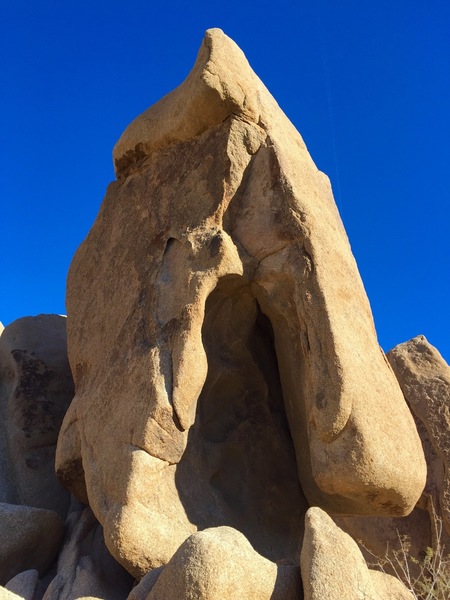 Potato gun shoots up the north face of this spire like boulder