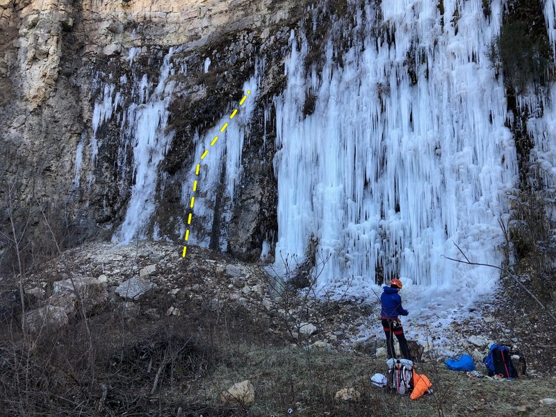 Cooing Pigeons is the second climb from the left. Junkyard Dog is the WIDE ice behind the climber in this photo. Taken Dec. 2018 on a super wet summer & Fall. Rap off a V thread at the highest, best piece of ice to do so.