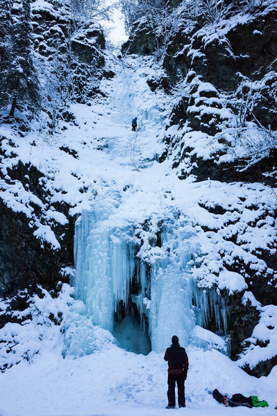 Early December, thin ice at Ripple, Bryan Hesse and Spencer Mitchell finishing the route up while Jim Mitchell watches