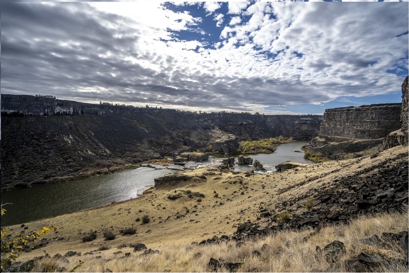 View downstream (to west) of Pillar Falls and Snake River from crag. Photo by Sean Muldoon. https://www.foreverwild.media/
