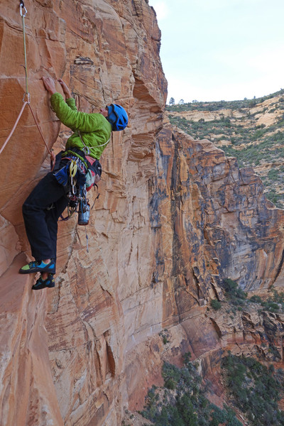 Exiting the primo belay ledge and heading over the Tetris blocks at the start of P3.