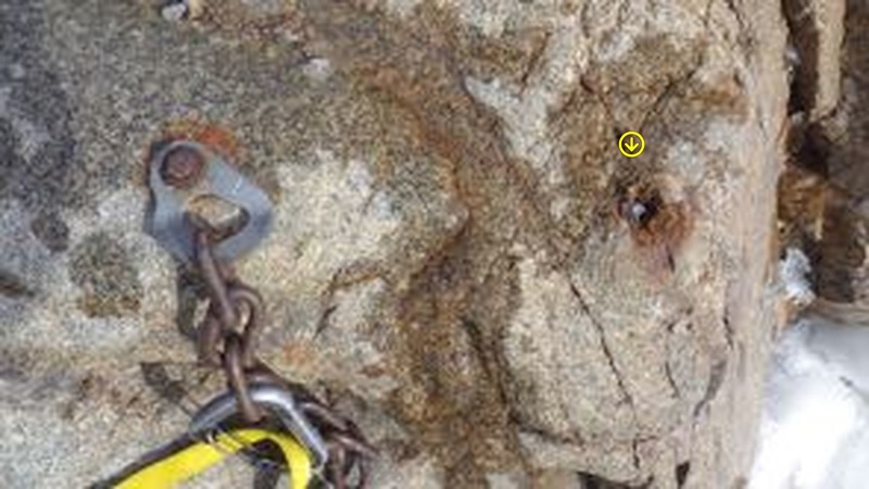The anchor on the climber's right replaced with SS 3/8" bolts. In this pic, the right bolt sheared off under less than body weight.