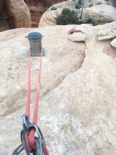 We didn't find a belay bolt on the summit so we rapped off the summit register....