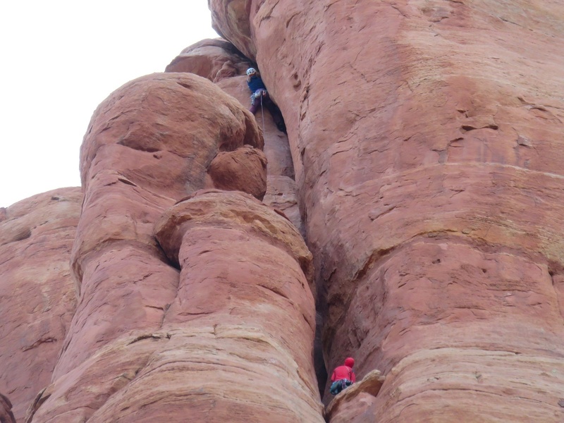 Pitch 4. Jenny is at the crux. (Photo taken by our dad on the ground below).