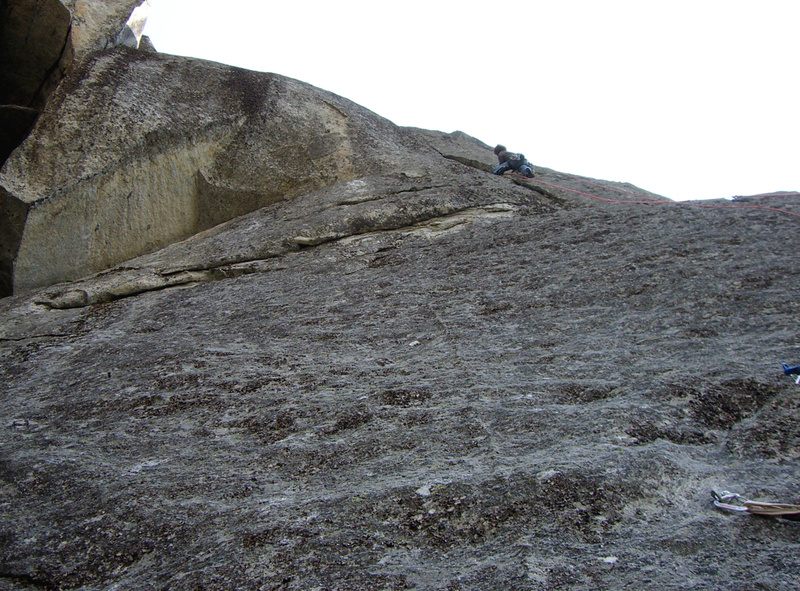 Mike climbing the splitter headwall pitch on the F.A. of Sharp Shooter