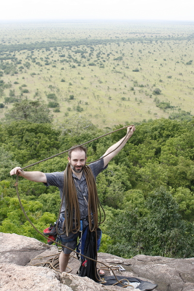 Merrick flakes the rope on top of Hioweyo (Talking Drum) overlooking the African plains.