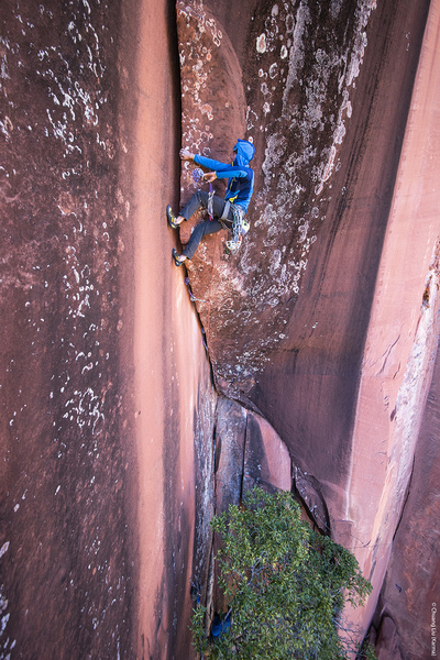 Placing some of the wide (but not the widest!) gear on the crux of Elephant Riders. photo: Chuang Liu/Karma Productions