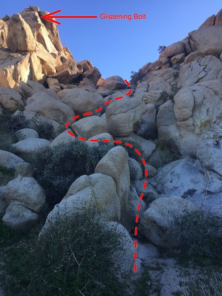 When you see a bolt glistening in the sunlight then scramble up these boulders to get to the routes.