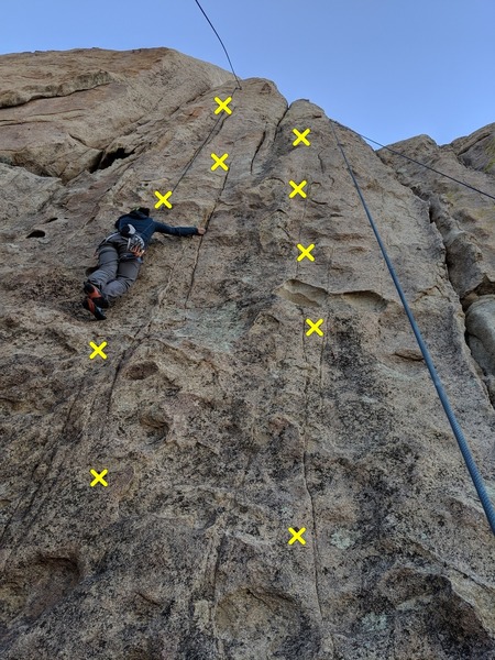 Climber is on Under Pressure (5.9) Unknown 5.9 is on the right.