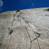 The steep cracks and flakes of the crux pitch