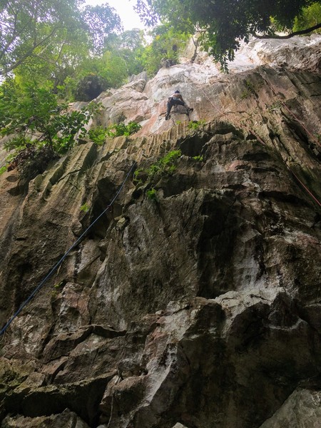 Climber tackling crux #1 on Ciao Chow Mein