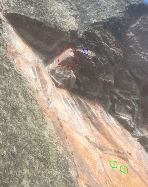 I stole Tony's photo to point out the now missing hold pulling the roof circled in red. mid route anchors circled in green. first bolt circled in blue.