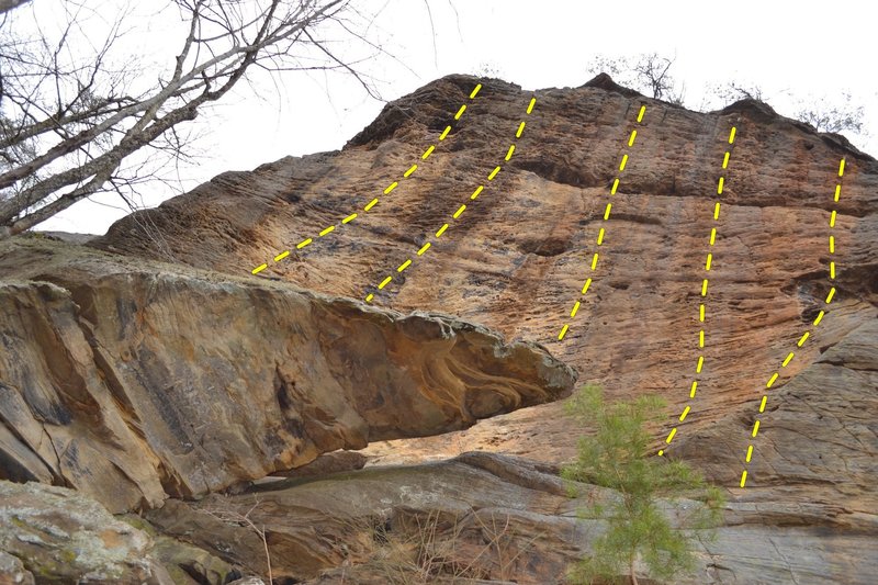 looking up at the first 5 routes at The Port from below the belay ledge. To access these 5 you go up and a round to the left
<br>
(the 2nd and 3rd route in this picture are Open come get the FA)