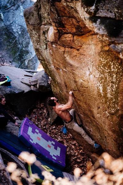 Kyle Harmon-Townsend on Pit BBQ (V6), East Side Boulders, Rumbling Bald, NC. Photo: Andy Wickstrom