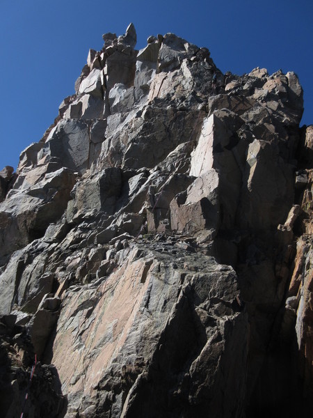 Looking back at the terrain rappelled into the notch. I think you could find a 5.8-5.9 way through this if going from Granite Pk to W Granite. Rappelling the chimney and ascending this would be harder, but keep you on MUCH better rock.