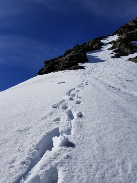 Narrow snow gully on the route.