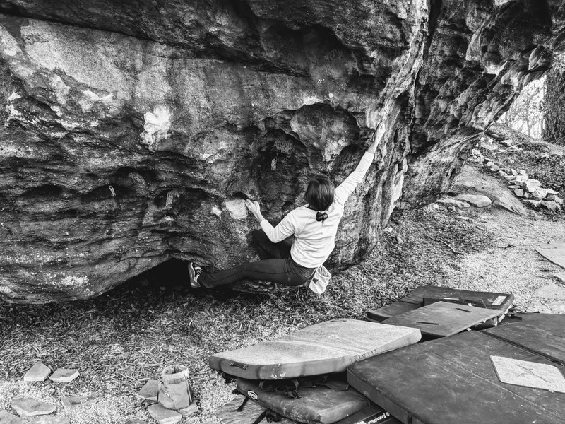 Cranking out the sit-start on "Chief Wauhtchie" V4/5, Cliffhanger Boulder. Big holds, big moves, big boulder.
