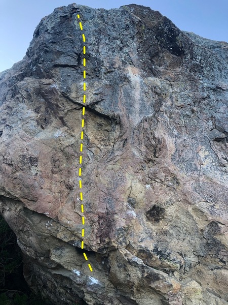 Start on those two chalky holds at the bottom, giant rail up to the right is off! Go straight up through the dark grey at the top.