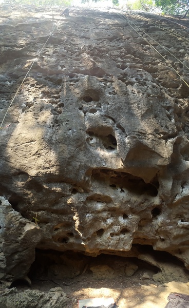An unknown climber topping out on White Rabbit.