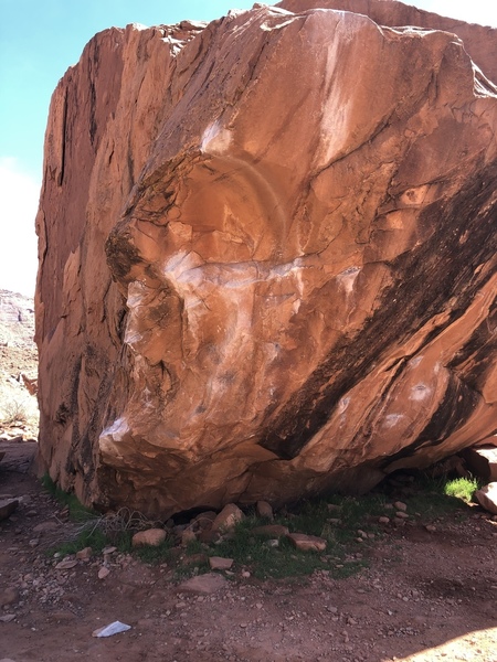 Broken hold laying under the climb