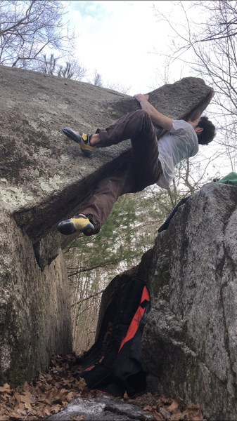 Almost ready to top out Red Eyes on the smaller side boulders across from Devil's Rock.