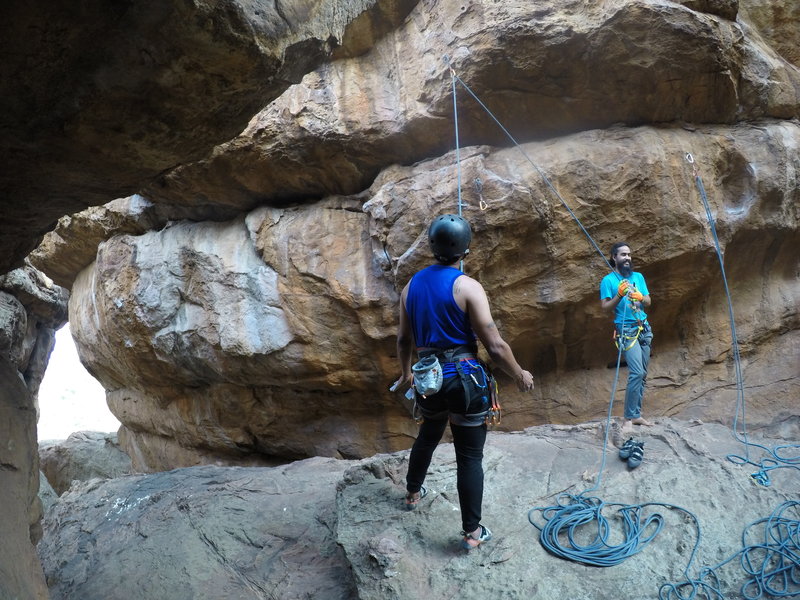 Climber clipped to second bolt in Never Hang. To the right, you can see the second rope clipped in to the first bolt of Heel Lock.