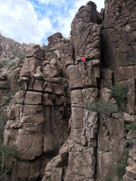 Cody waving to the crowd on his first outdoor climb.