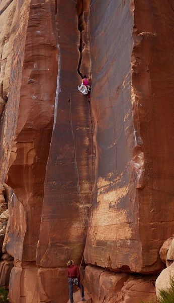 Hannah changing her climbing colors, while onsighting with Jenessa. 15 Apr 2019.