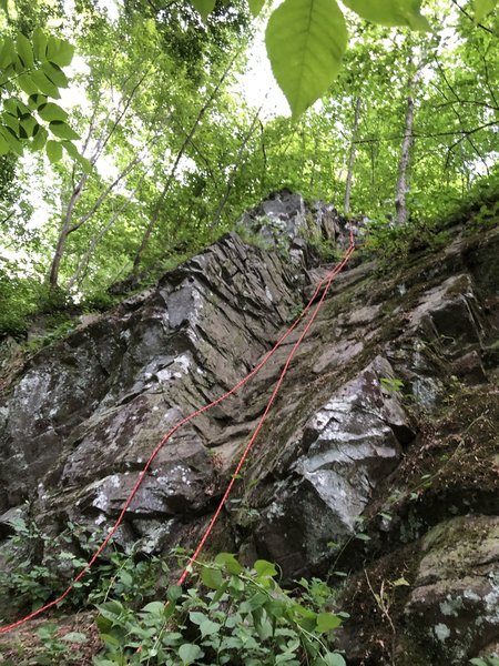 Go to the end of Tar Hill dr near the intersection at BPW club rd. Park at the dumpster and start walking east along the creek. After 10ish minutes you'll find 2 good rocks for TR. they are not very tall but good to practice rope technique.