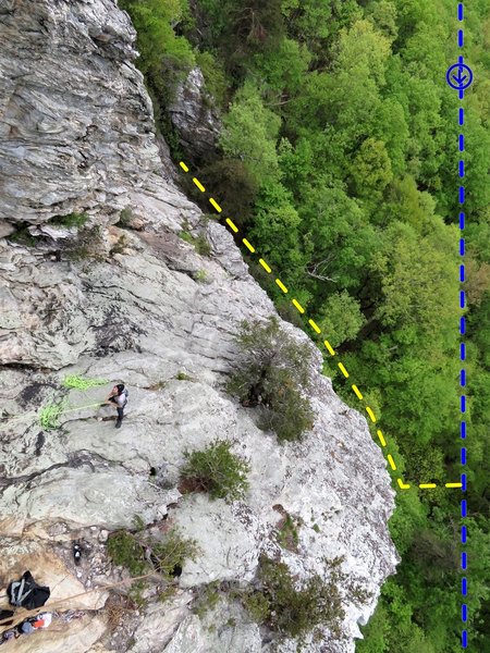 Sky-Net belay ledge with trail topo lines. Blue is main trail w/ direction of travel to Cookbook. Yellow is the trail going up Sky-Net access gully. Notice at the top of the picture just above the tip of the yellow line is someone climbing the slab.