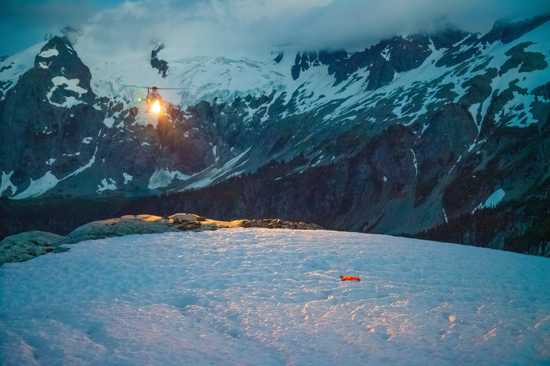 Airlift Northwest coming in for a rescue on the south side of Spider-Formidable Col, Le-Conte in the distance