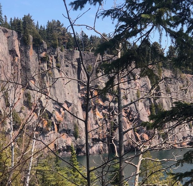 Middle section of Shovel Point. Climbers visible at top are above Rise Over Run/Cornered. Dance of Plump Fairies is visible on the far left