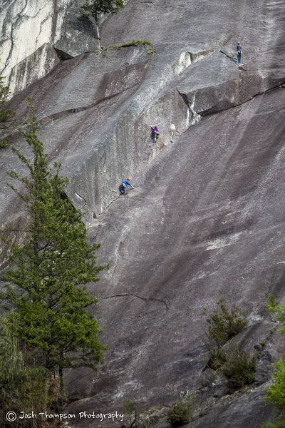 Climber in blue shirt is at the top of the 4th pitch, Purple is on the 5th Pitch